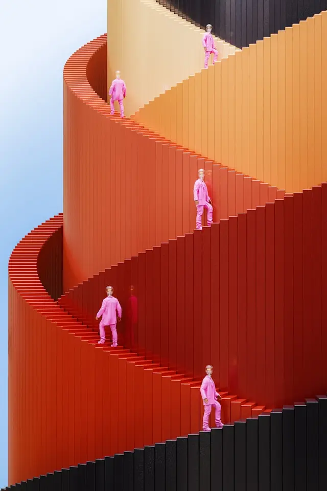 Several identical figures in pink outfits standing on a winding red staircase that curves upward against a gradient sky background, creating a surreal and abstract scene.